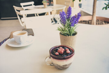 Fototapeta na wymiar Coffee and Trifle raspberry dessert for enjoyment