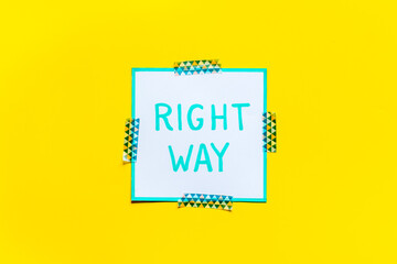 Right way icon on yellow office desk top view