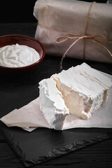 homemade cheese, milk and cottage cheese on a wooden background. rustic style. Set of dairy products, assortment of milk, cottage cheese, sour cream and yogurt