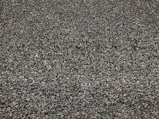 Gray asphalt texture.  A whole dry roadbed.