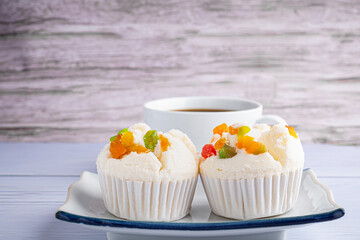 Thai steamed cupcakes topped with dry fruit on plate