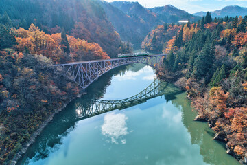 Tadami Line - Tadami railway line and Tadami river in autumn season, Fukushima, Japan.