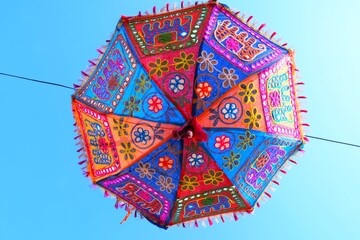 Umbrella hanging in the sky, colorful umbrella
