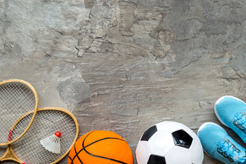 Sport games background - basketball, soccer ball, rockets, sneakers - copy space