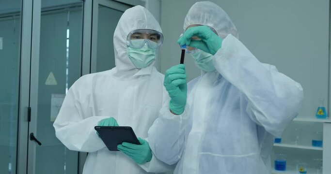 Two Scientists Working On Coronavirus Vaccine At Lab. 