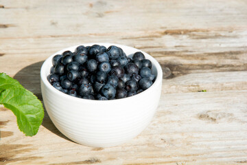 blueberries on wooden background