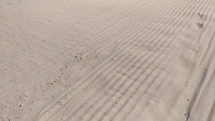 Sand on the beach after being smoothed out