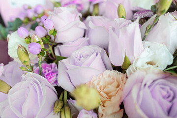 Bouquet of fresh purple flowers close up, holiday background.