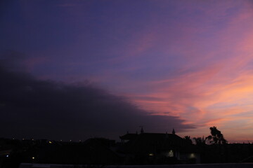 dusk in town, sunset, red sky over the city