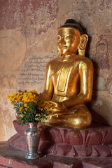 Golden sitting  Buddha  statue in Sulamani temple in Bagan, Burma Myanmar