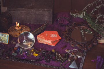  Tarot cards, Concept of fortune telling and predictions, magical rituals and wicca elements on a table