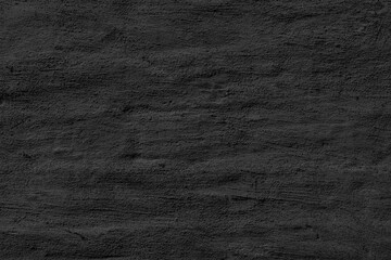 Black stucco texture. Designer interior background. Abstract architectural surface.