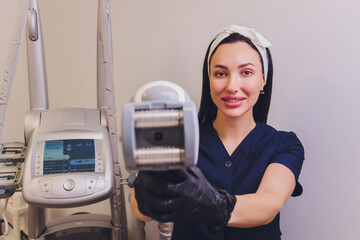 Hardware cosmetology. Vacuum massage. Beautiful young woman.