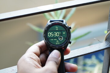 A round black smart watch