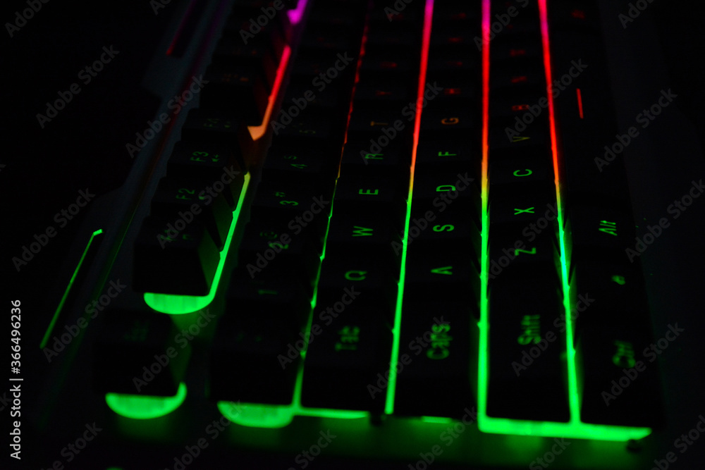 Fototapete computer keyboard with coloured letter keys