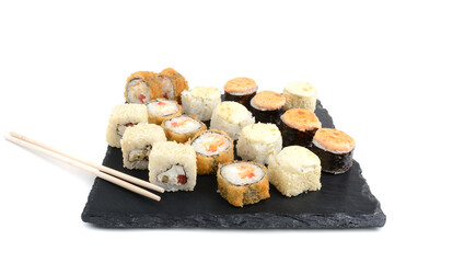 Corn oil in a carafe, peeled corn cobs and grains, text space isolated on a white background