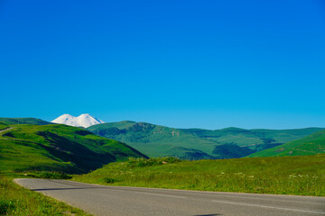 Panorama Road Leading To Mount Elbrus In Summer.