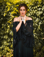 Woman fortune teller on a crystal ball, Concept of predictions, magic rituals and wicca