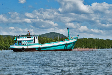 Fototapeta premium Boat on the River in Sihanoukville, Cambodia
