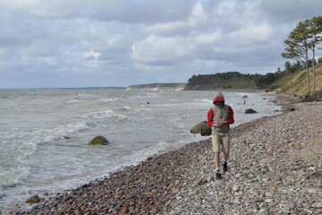 boy on the beach and waves