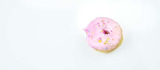 Fototapeta na wymiar Donut mini with colorful sprinkles isolated on white background. Top view.