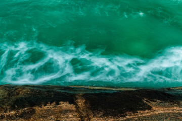 Fototapeta na wymiar Water flowing at the sea. #3