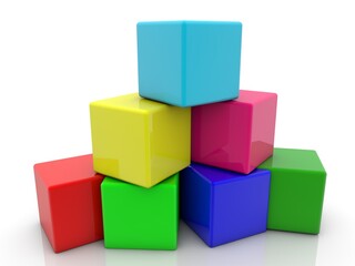 Colored toy blocks stacked in a pyramid on top of each other