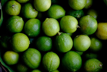Lime group dark color in the basket vegetarian sour taste from natural at local market background