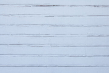 White texture of a painted wooden wall from slats.