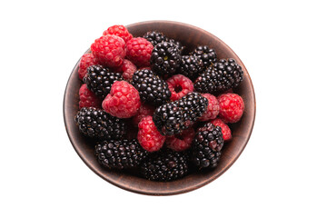 Raspberry, blackberry and mint leaf in ceramic brown bowl isolated on white