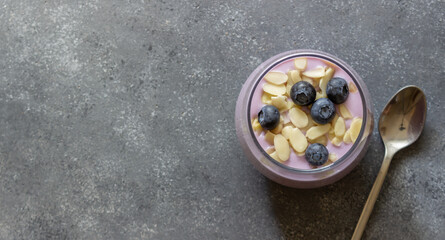 Yogurt with blueberries and almonds. Healthy eating. Vegetarian food. Breakfast. Dessert.