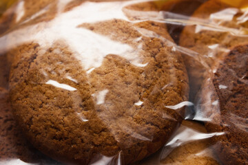 Homemade oatmeal cookie on the wooden background