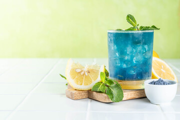 Blue matcha lemonade on white background, copy space