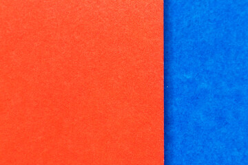 Abstract red and blue color paper textured background with copy space for design and decoration