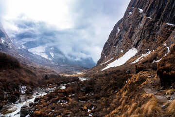 Trekking in Annapurna region with Annapurnas in the background