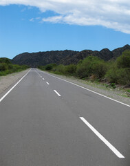 Naklejka premium Road between Chile and Argentina through Andes mountains