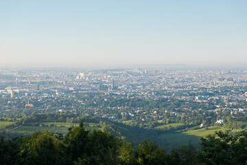 Scenic view over the City of Vienna and the vine yards of suburban fringe area from Kahlenberg in the morning.
