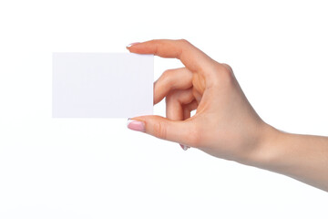 Female hand with blank white business card isolated on white