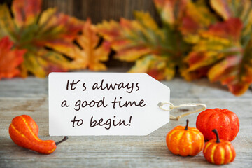 White Label With English Qoute It Is Always A Good Time To Begin. Wooden Background With Autumn...
