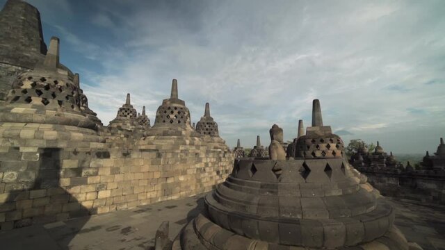 Candi Borobudur - Mahayana Javanese Buddhist Temple UNESCO World Heritage Site - Stupas and Buddha Statue in Yogyakarta Magelang, Central Java, Indonesia Indonesian
