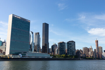Fototapeta na wymiar Skyscrapers along the East River in the Midtown Manhattan Skyline in New York City