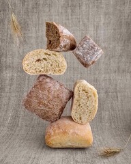 Pieces of bread on nature cloth, balance and levitation