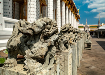 Wat arun, Chinese lion stone statues, Chinese carved stones that are decorated around temple of dawn, Bangkok.