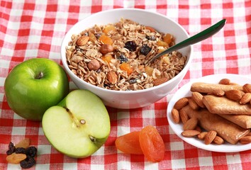 Bowl of cereal and apples