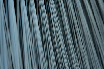Close up photo of fringes of a broom