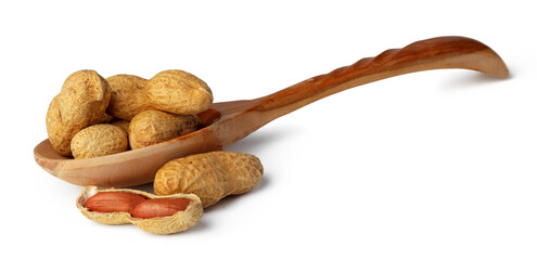 Spoon of peanuts in shell isolated on white