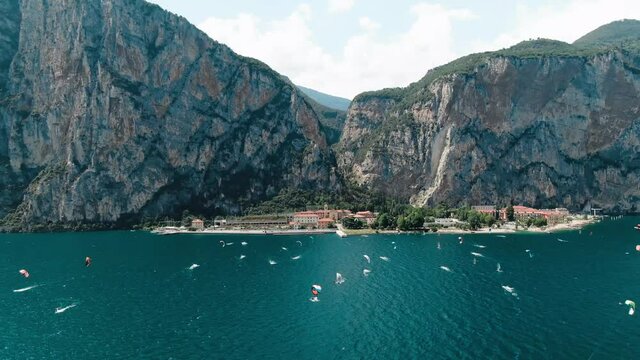 Kitesurfer in front of mountains, lake garda