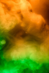 Abstract colorful, multicolored smoke spreading, bright background for advertising or design, wallpaper for gadget. Neon lighted smoke texture, blowing clouds. Modern designed.
