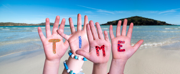 Children Hands Building Colorful English Word Time. Ocean And Beach As Background