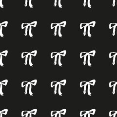 Seamless hand drawn pattern with bows.